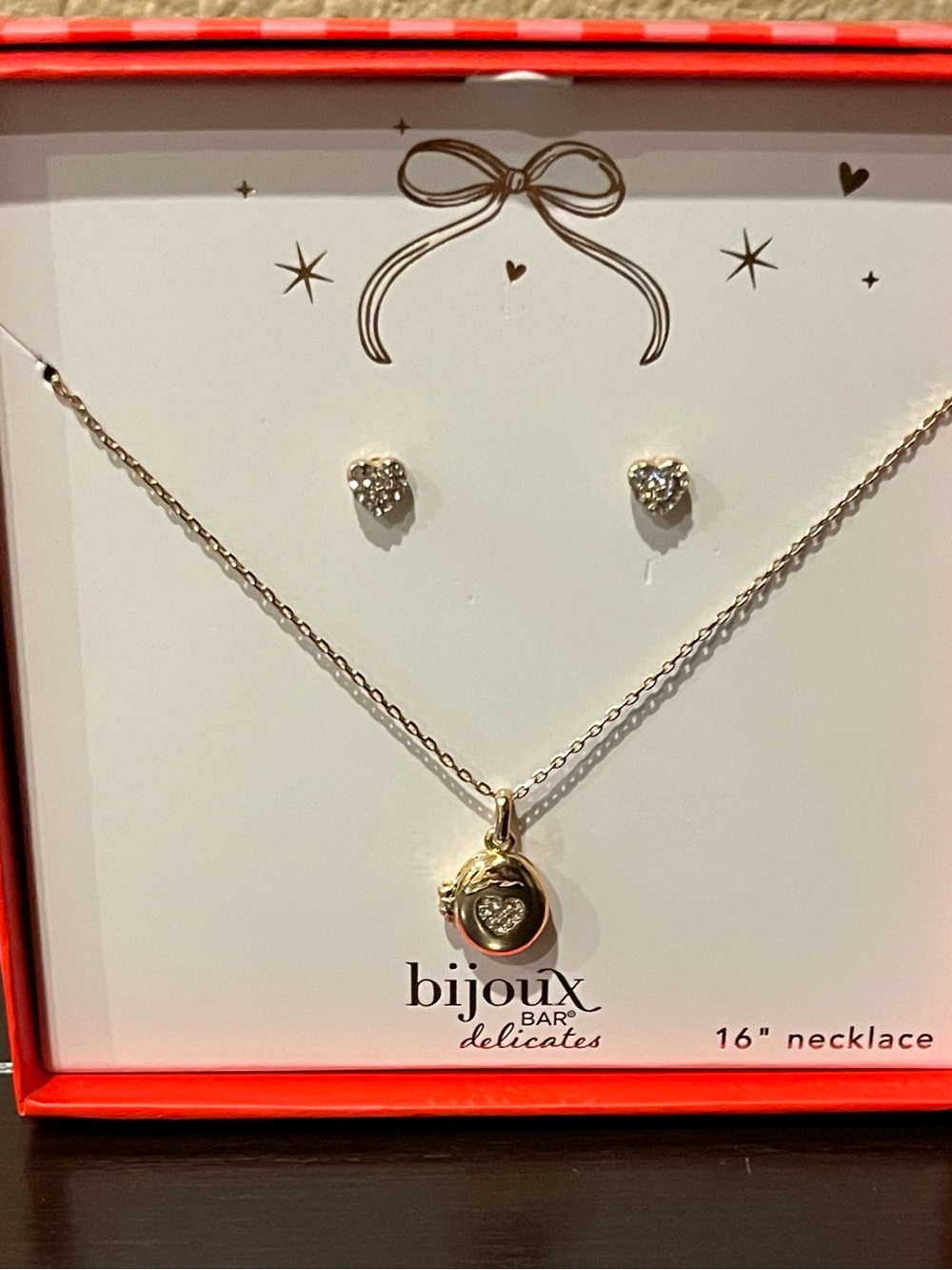 New in box, Bijoux Bar delicates necklace locket and earrings set.